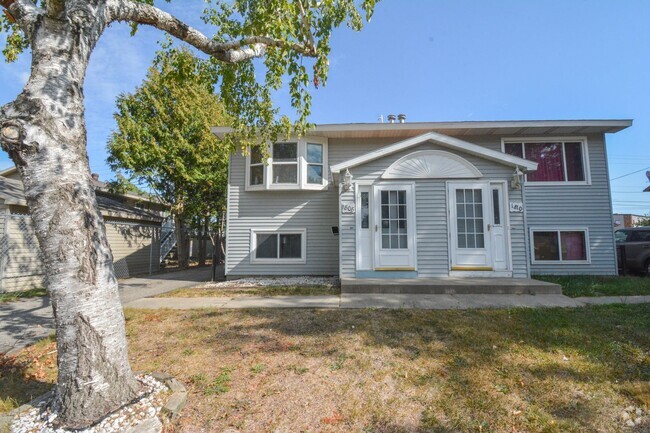 Building Photo - Spacious 2 Bed, 1.5 Bath Split-Level Townh... Rental