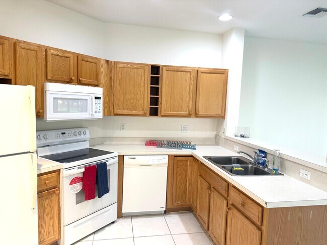 Photo - 8239 Mulligan Cir Unit 3514 Side A