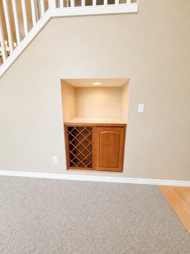 Photo - Spacious 4-Bedroom Home with Bonus Room, Trex Deck & Pergola in Prime Maple Valley