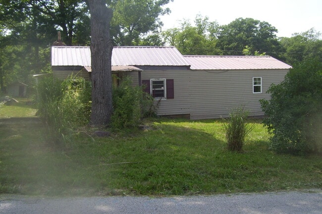 Photo - BISMARCK - 2BD/Fireplace/Metal Roof, Vinyl Siding/Iron Mt Lake ONLY - $399 MONTH / $695 DOWN