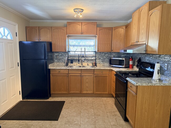 Kitchen - 4126 35th Ave N Unit Apartment