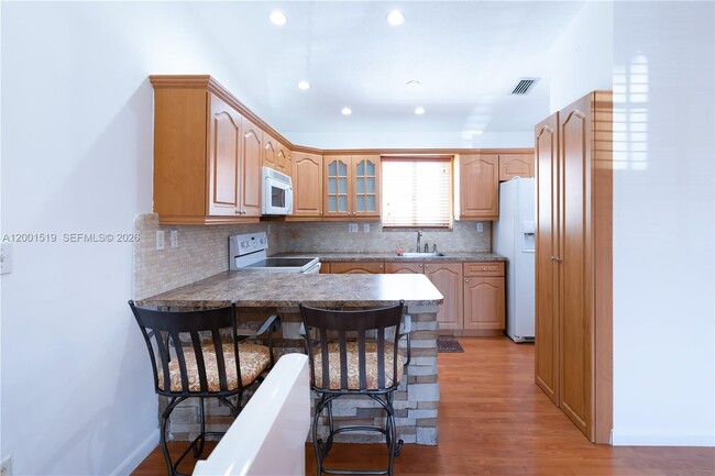 Photo - 10017 W Okeechobee Rd Unit 202