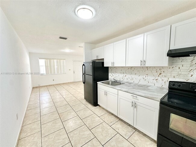 Photo - 1171 NW 58th Terrace Unit 1173