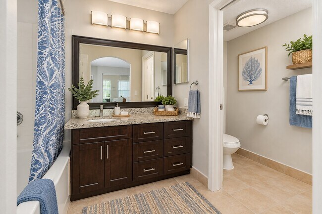 Elevate your daily routine in the beautifully designed bathroom of Whaler's Cove. Features include a spacious vanity, modern fixtures, and serene décor that create a tranquil escape. Transform your lifestyle today—schedule a tour!