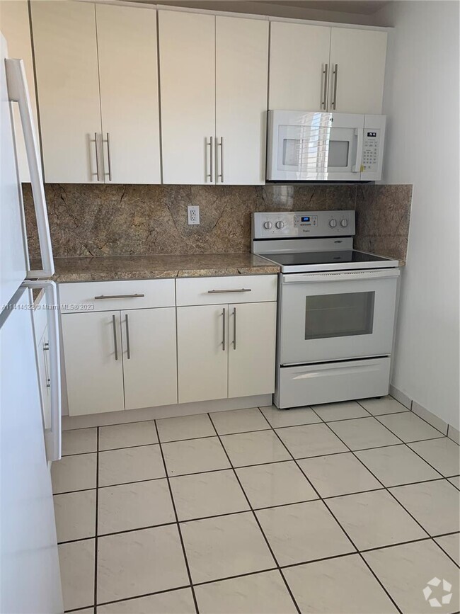 Building Photo - 7703 Camino Real Rental