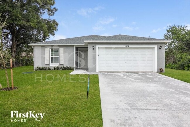 Building Photo - 1573 SW Bermel Ave Rental