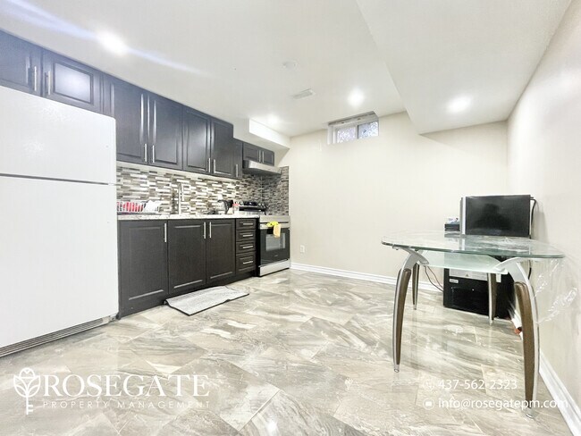 Photo - Modern 1+Den Basement Apartment – Bright &... Unit 2