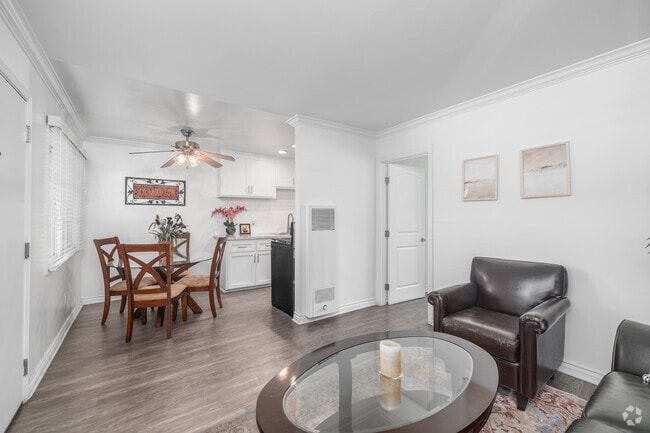 1BR, 1BA - 700SF - Living Room - Village Apartments