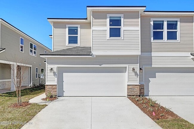 Photo - Modern 3-Bedroom Townhome with Two-Car Garage in Crossroads Station