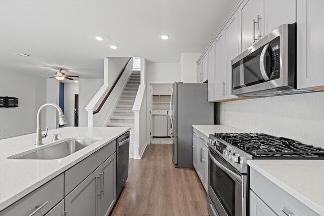 Building Photo - Spacious 3 Bedroom Townhome in Gated Community