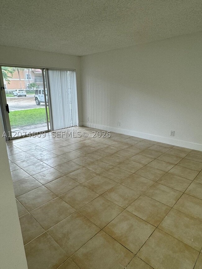 Photo - 8801 Wiles Rd Unit 103
