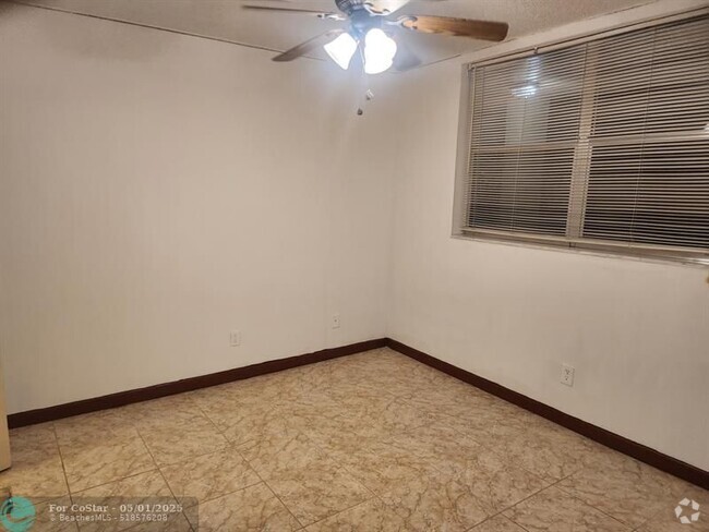 Building Photo - 5830 NW 64th Ave Unit 209 Rental