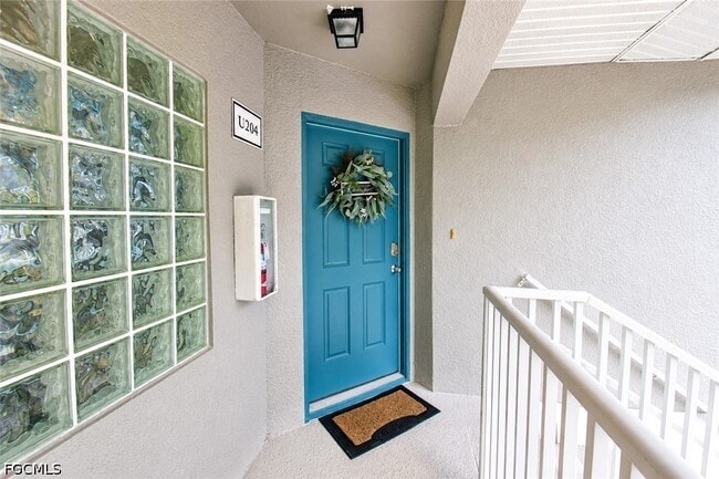 Building Photo - 12181 Summergate Cir Unit 204