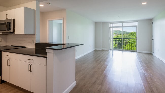 Living Room with Balcony and Hard Surface Flooring