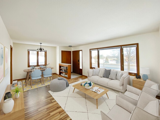 Large, bright living space, with new flooring, fixtures and paint.