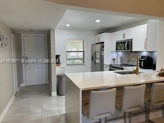 Building Photo - 8360 Boca Glades Blvd E Unit 8360 Rental