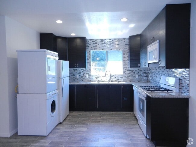 Building Photo - KESSELRUN WILSON--3527-3531 Wilson Ave Unit 3531 Rental