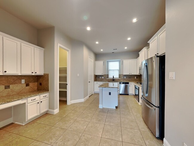 Photo - An elegant retreat designed for comfort, entertaining, and year-round enjoyment.