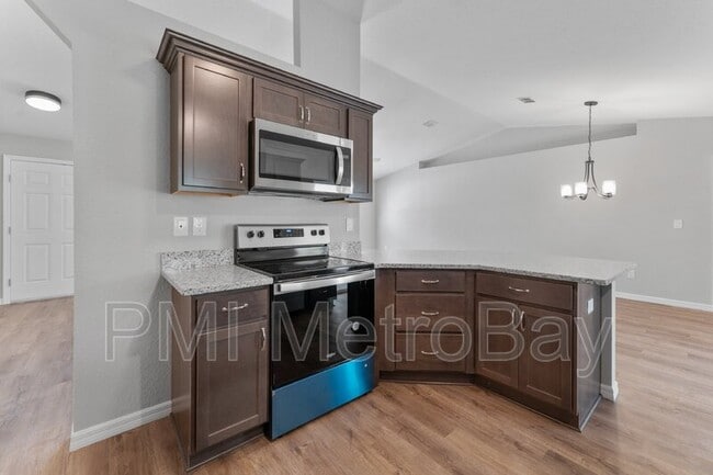 Building Photo - 9461 N Sandree Dr Rental