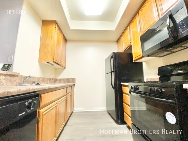 Building Photo - 3625 Jasmine Ave Unit 201