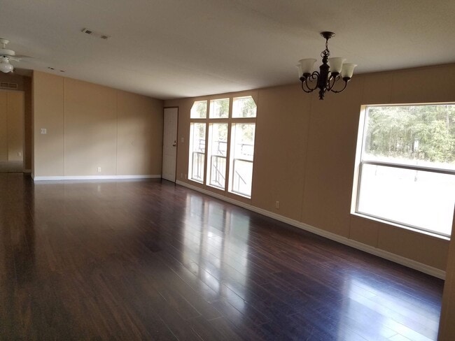 Photo - 3 bedroom 2 bath on 1/2 acre of land with a FENCED YARD