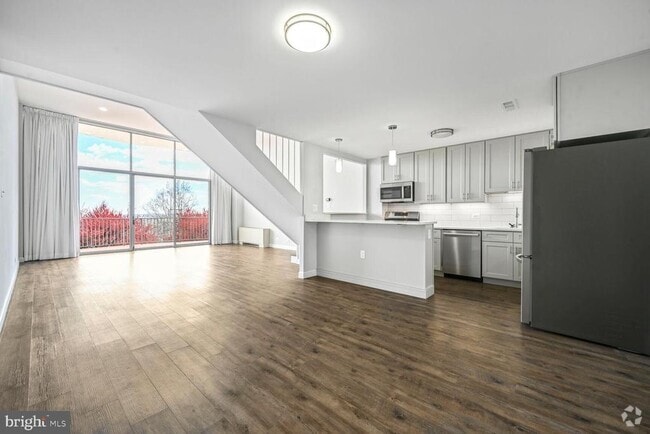 Building Photo - 1200 N Nash St Unit 552 Rental