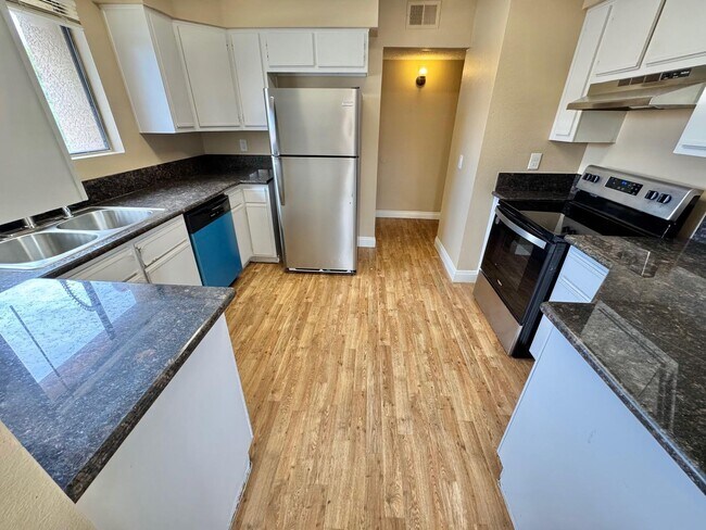 Photo - THIS SECOND-FLOOR DESERT SHORES CONDO OFFE...