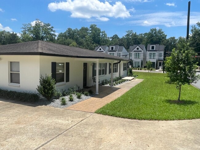 Triplex Front - 124 W 4th Ave Townhome