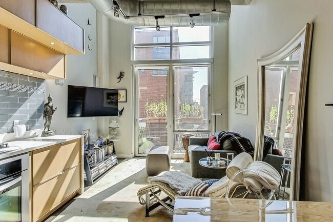 Building Photo - Two-Level Loft Condo at The Metropole Unit 405 - 1