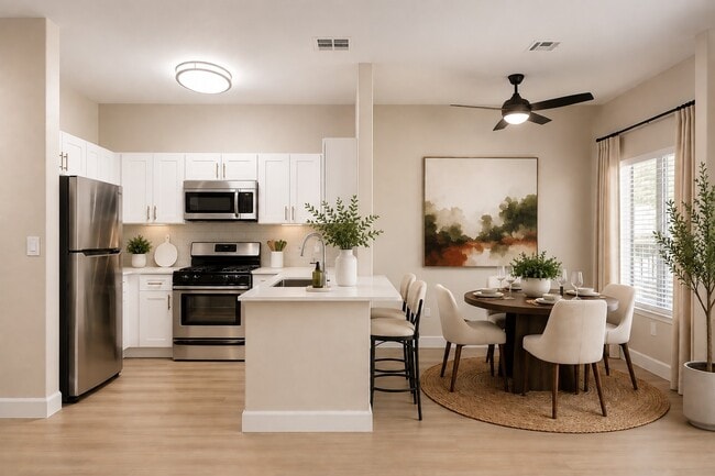 Step into modern living at Red Rock Villas, where contemporary design meets comfort. This stunning kitchen and dining area blend stylish finishes with functionality. Elevate your lifestyle today—schedule your tour now!