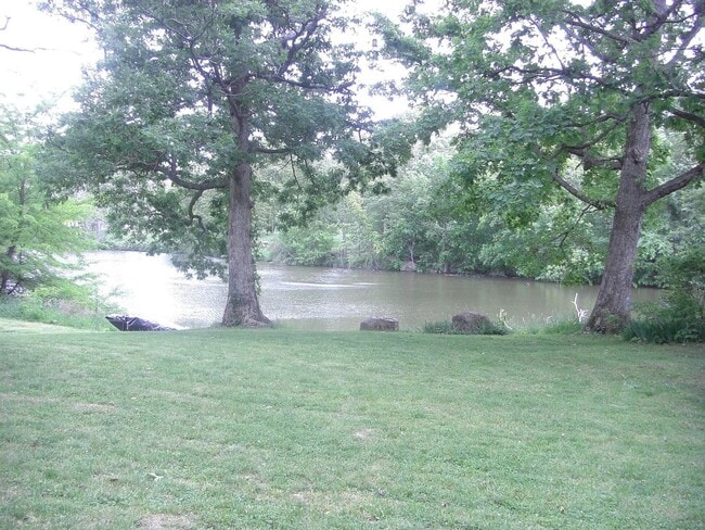Building Photo - Beautiful Duplex Located in Serene, Wooded... Rental