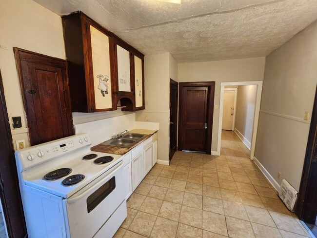 Photo - Charming 4-Bedroom Property in Prime Location (SECTION 8 VOUCHERS ACCEPTED)