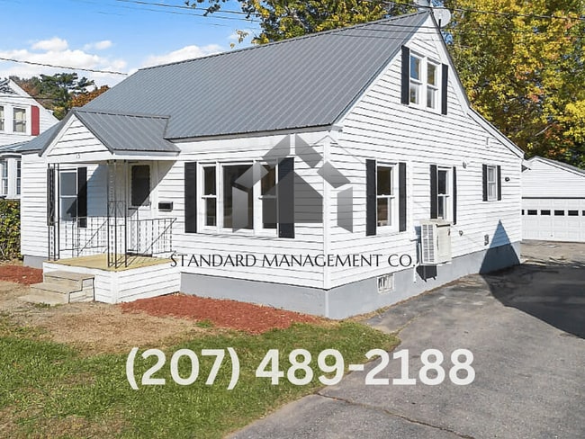 Building Photo - Spacious 4-Bedroom Home with Garage & Mode...