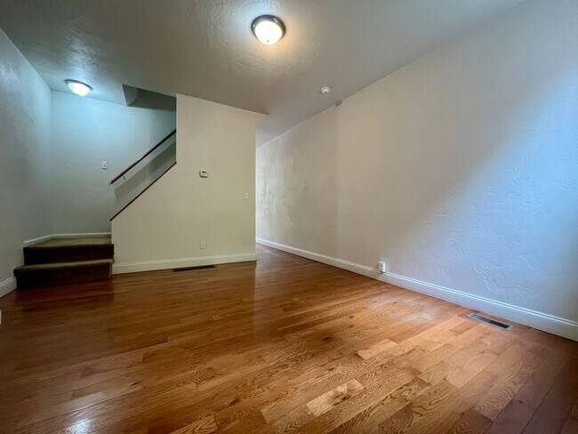 Photo - Lovely Two Bedroom Townhome with Hardwood Floors throughout! Washer & Dryer Provided!