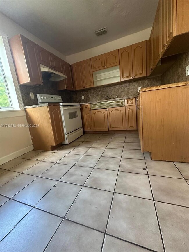 Photo - 1087 NW 51st St Unit 1089