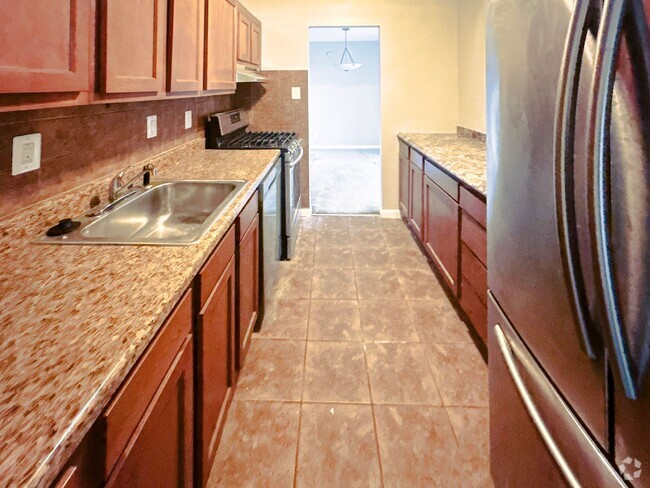 Building Photo - NEWLY AVAILABLE - RENOVATED 3 BR UNIT IN T... Rental