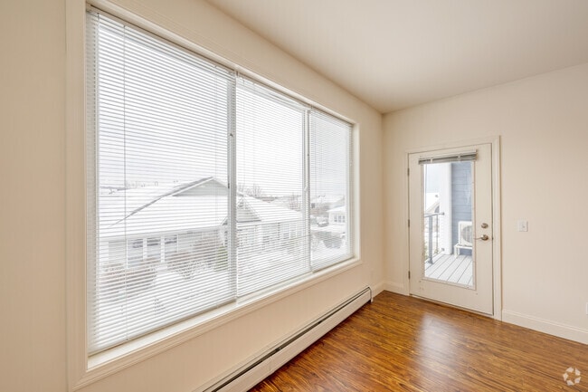 1BR, 1BA - 850SF - Living Room and Balcony