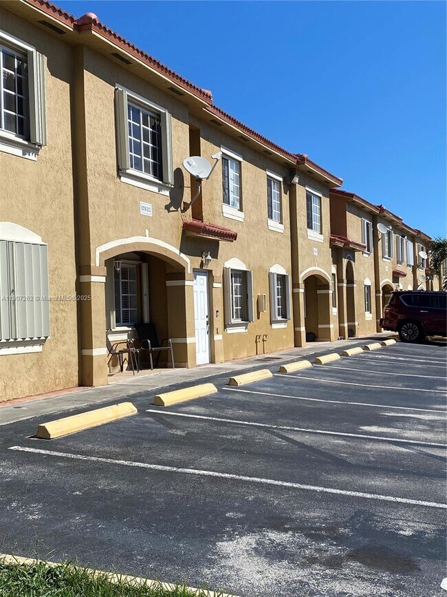 Building Photo - 8100 W 28th Ct Unit 210