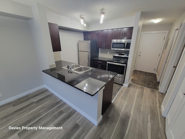 Building Photo - 3211 James Mowatt Trail SW