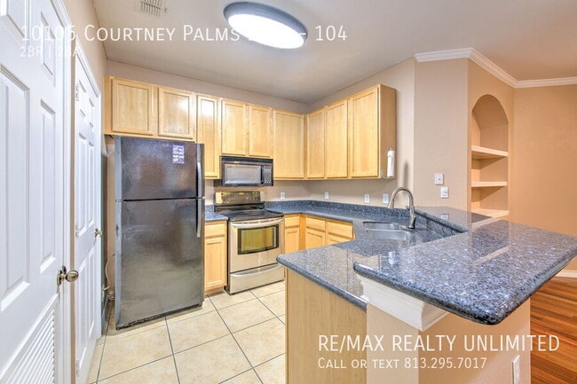 Photo - 10105 Courtney Palms Blvd Unit 104