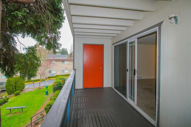 Enjoy fresh air and city views from your balcony patio at Foster Creek in Tukwila.