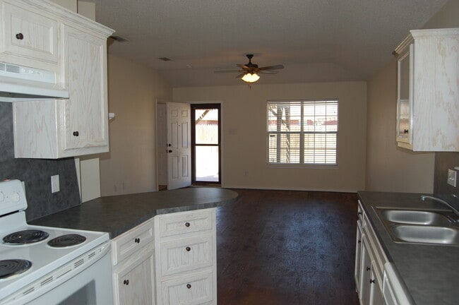 Photo - Stylish 3/2/2 Home with Fireplace and Cove...