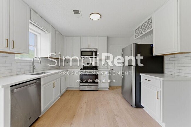 Photo - Updated Home with Spacious Layout & Private Backyard