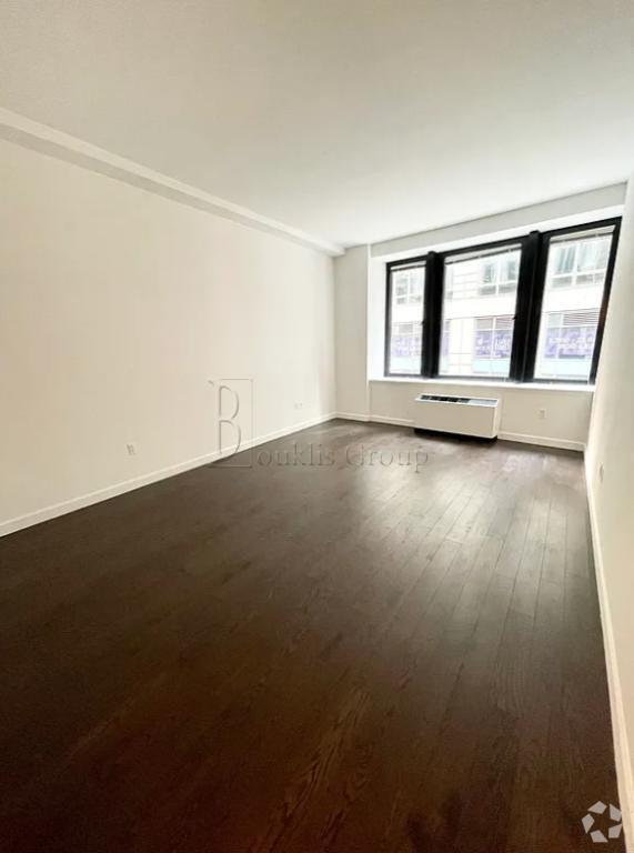 Building Photo - 1 bedroom in Manhattan NY 10004 Unit 305 Rental