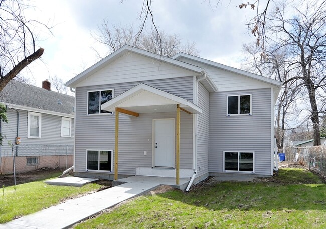 Building Photo - Spacious 4 Bed, 2 Bath Single-Family NEW B... Rental