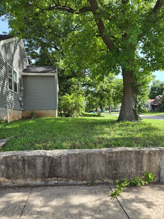 Photo - Charming 2-Bedroom Home with Open Floor Plan & Fenced Backyard