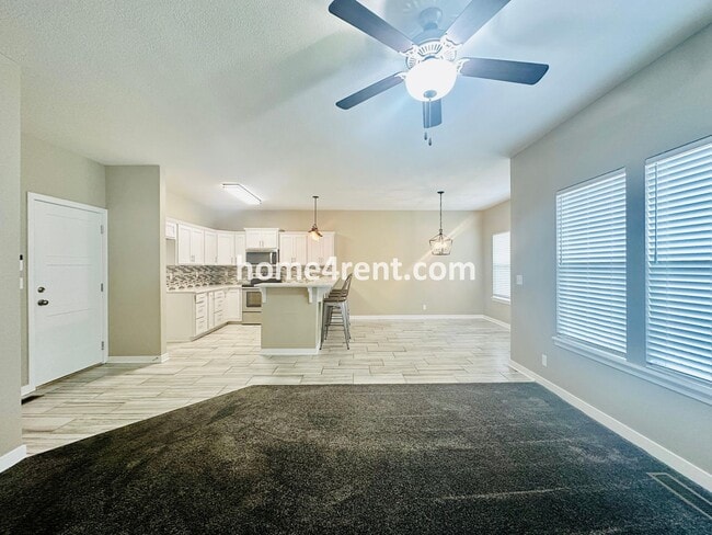 Photo - Ranch Style Home w/ Updated Kitchen, including SS Appliances and Granite Counters Plus a Large Un...