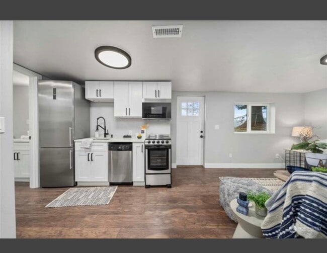 Full kitchenette - 8042 S Bell St Apartments Unit Ste A