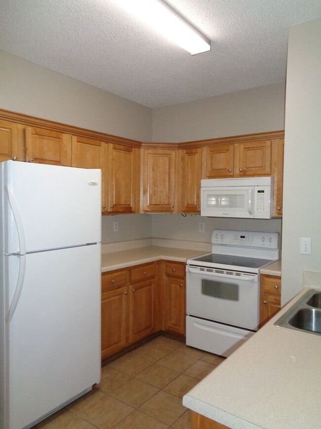 Photo - Courtyard Way - End Unit on Large Corner Lot!