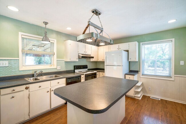 Photo - Charming 3-bed/2 bath home with large yard, screened deck located minutes from Brier Creek!